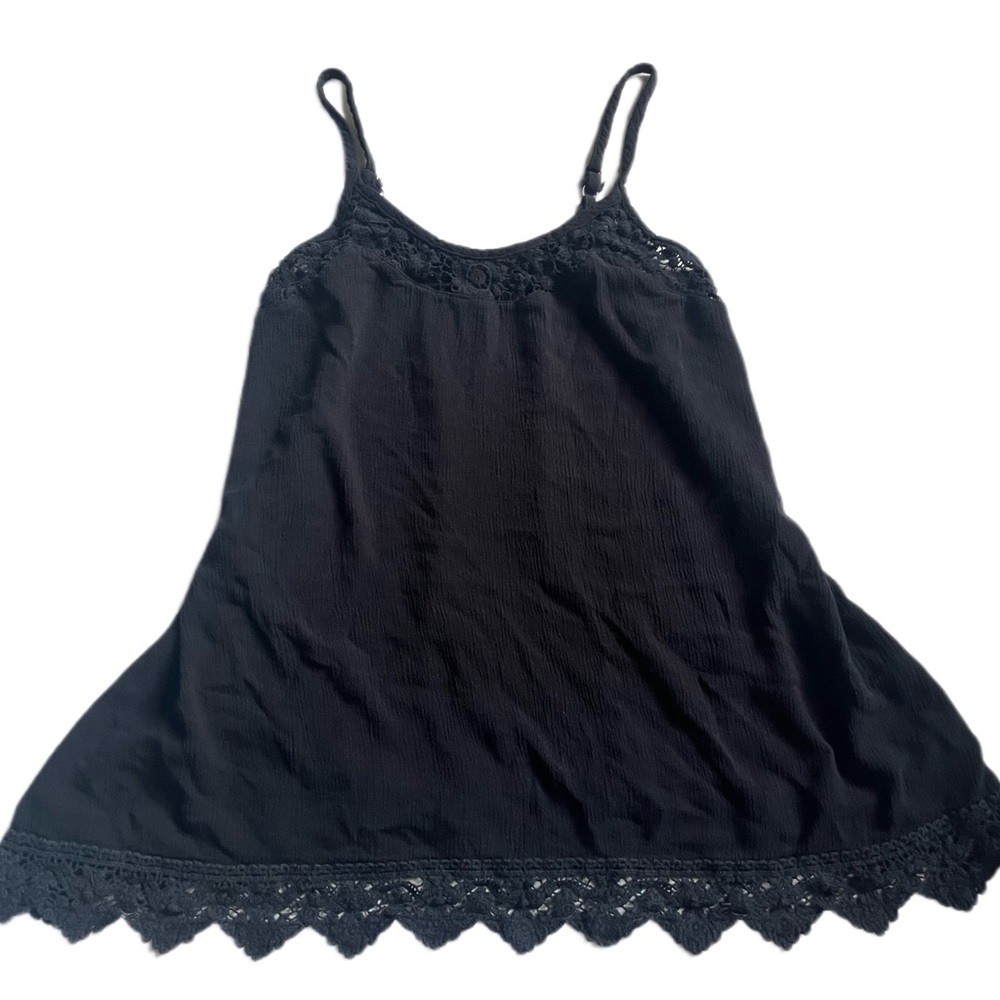 super cute black tank/cami top with lace details on top and bottom!